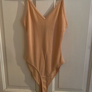 Body suit , light peach